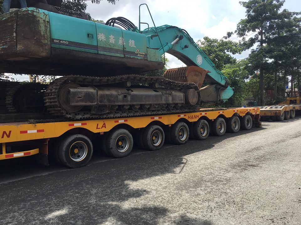 Vận chuyển máy đào cơ giới quá khổ quá tải
